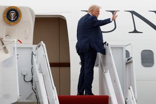 File image: Donald Trump waves as he boards Air Force one in Maryland